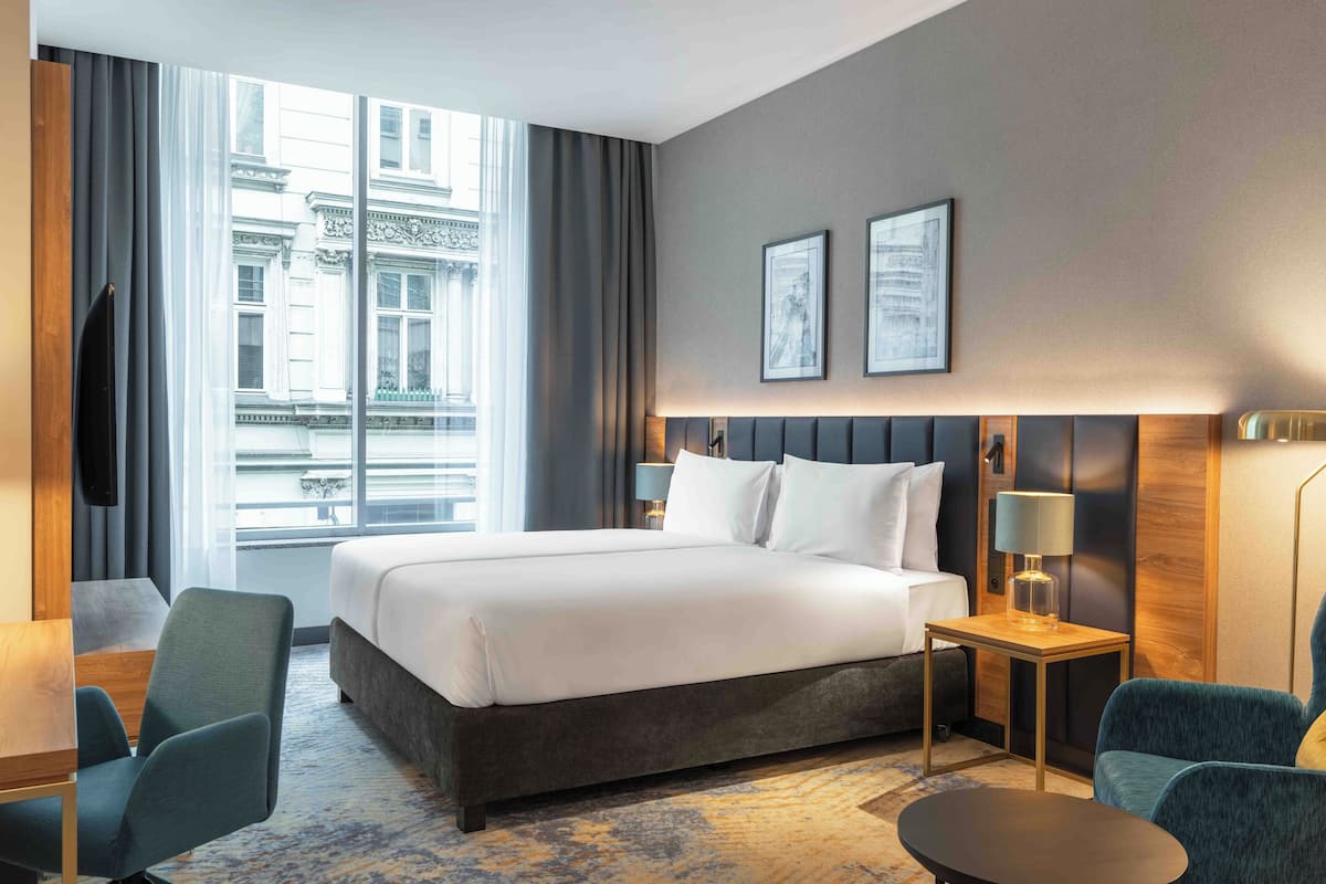 premium room, 1 king bed | in-room safe, desk, laptop workspace, soundproofing