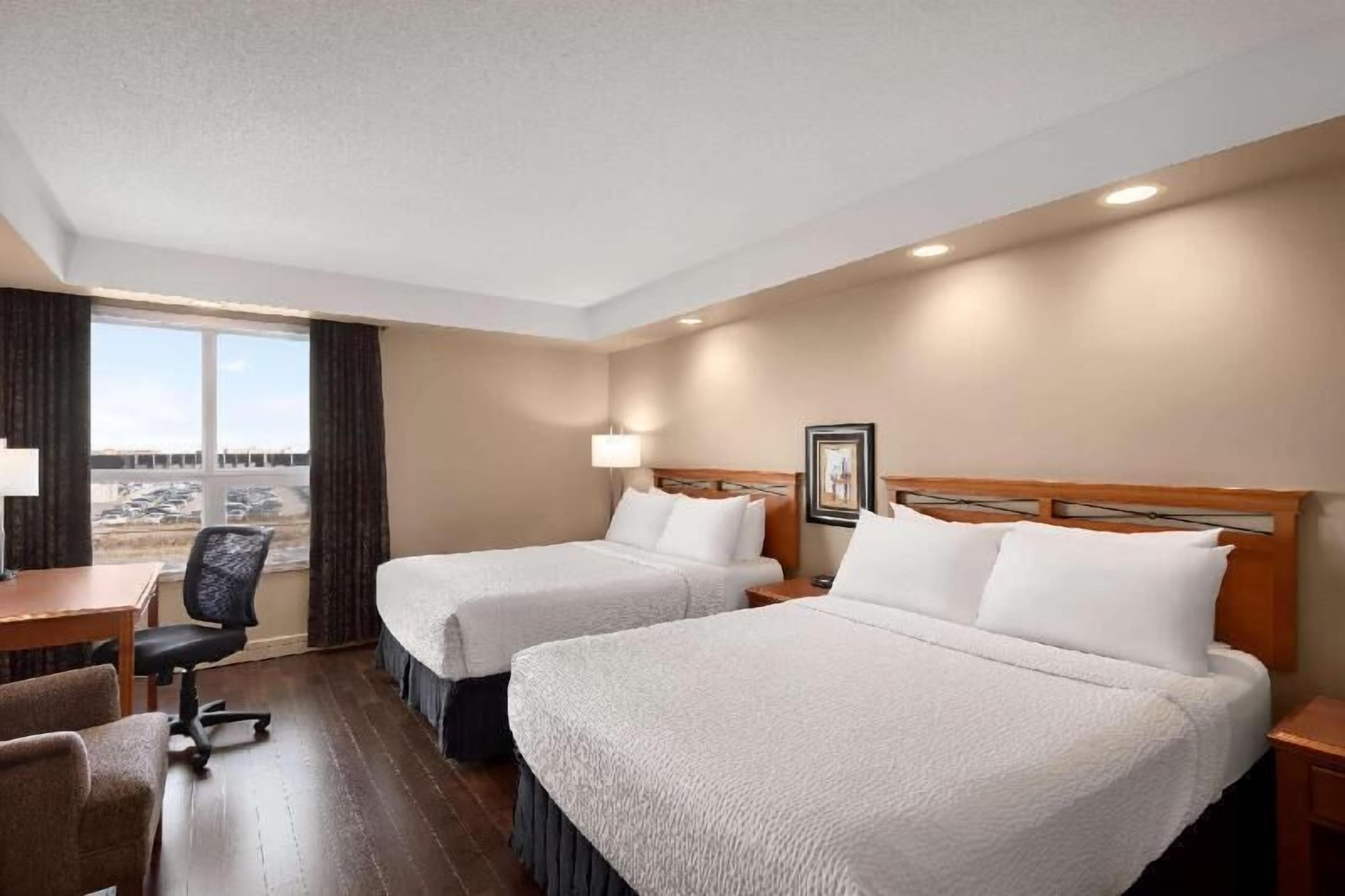 Premium bedding, pillowtop beds, in-room safe, individually furnished
