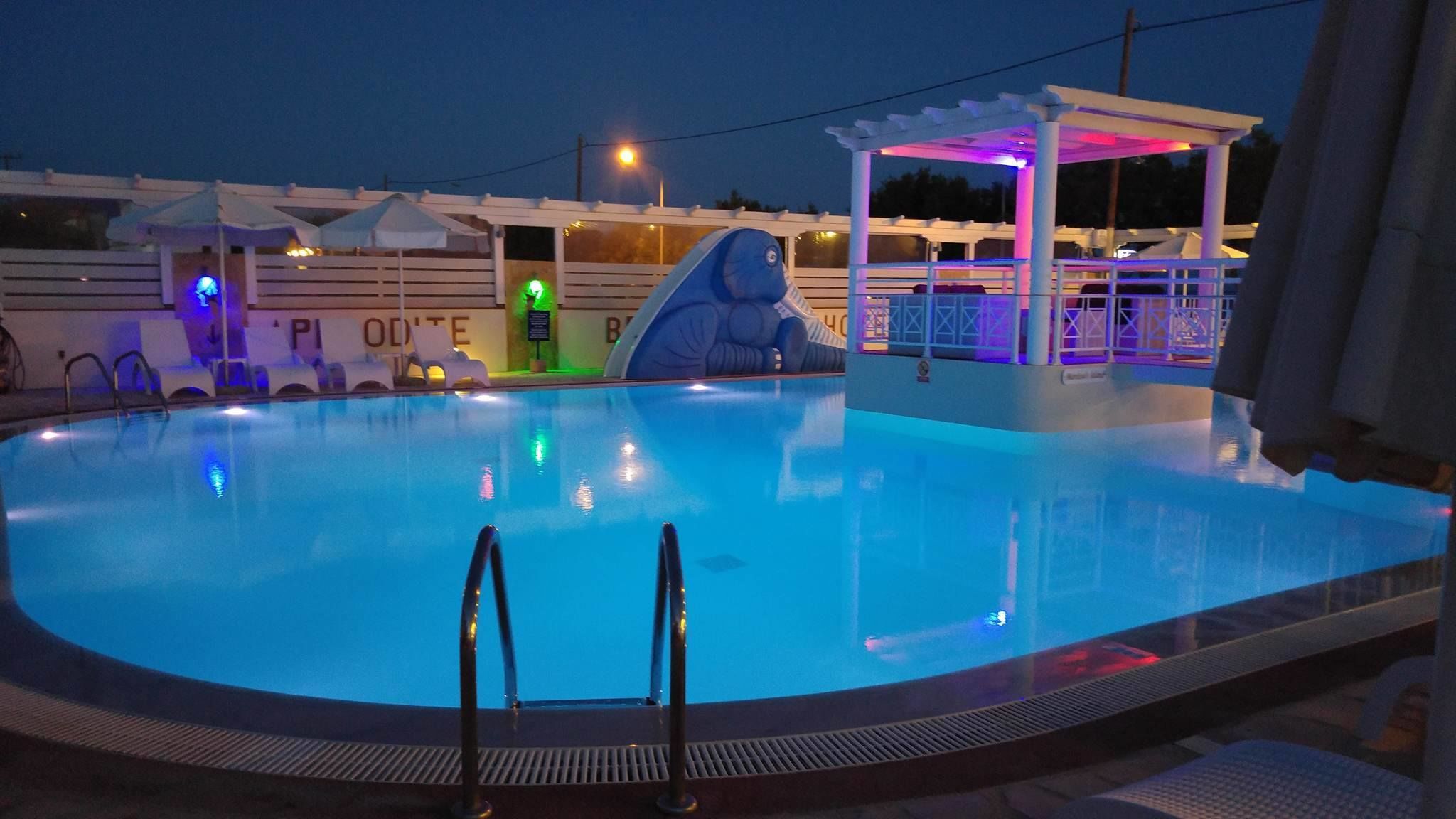 seasonal outdoor pool, pool umbrellas