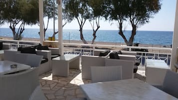 Breakfast, lunch, dinner served; Mediterranean cuisine, beach views