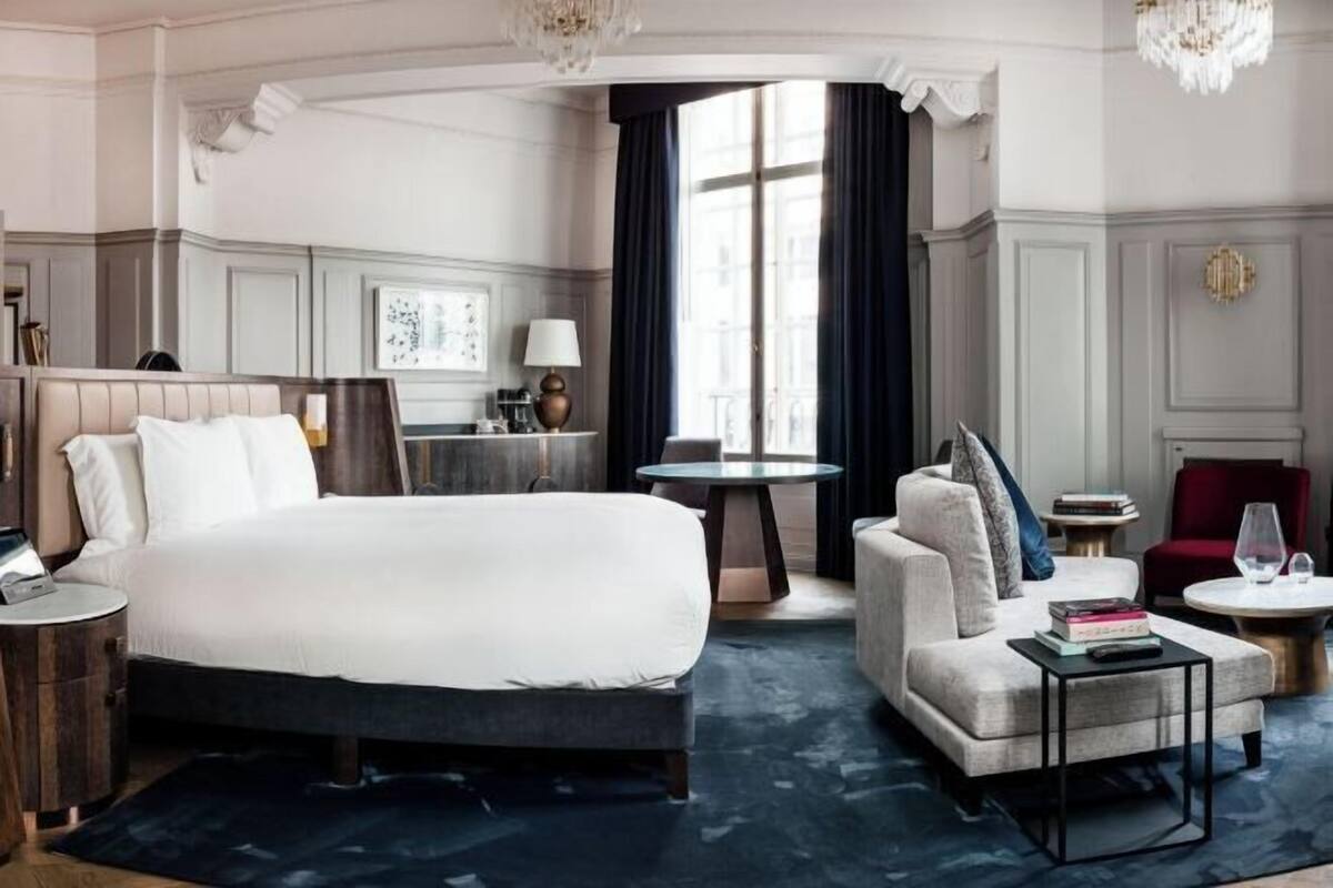 Llençols de cotó egipci, roba de llit d'alta qualitat i minibar gratuït