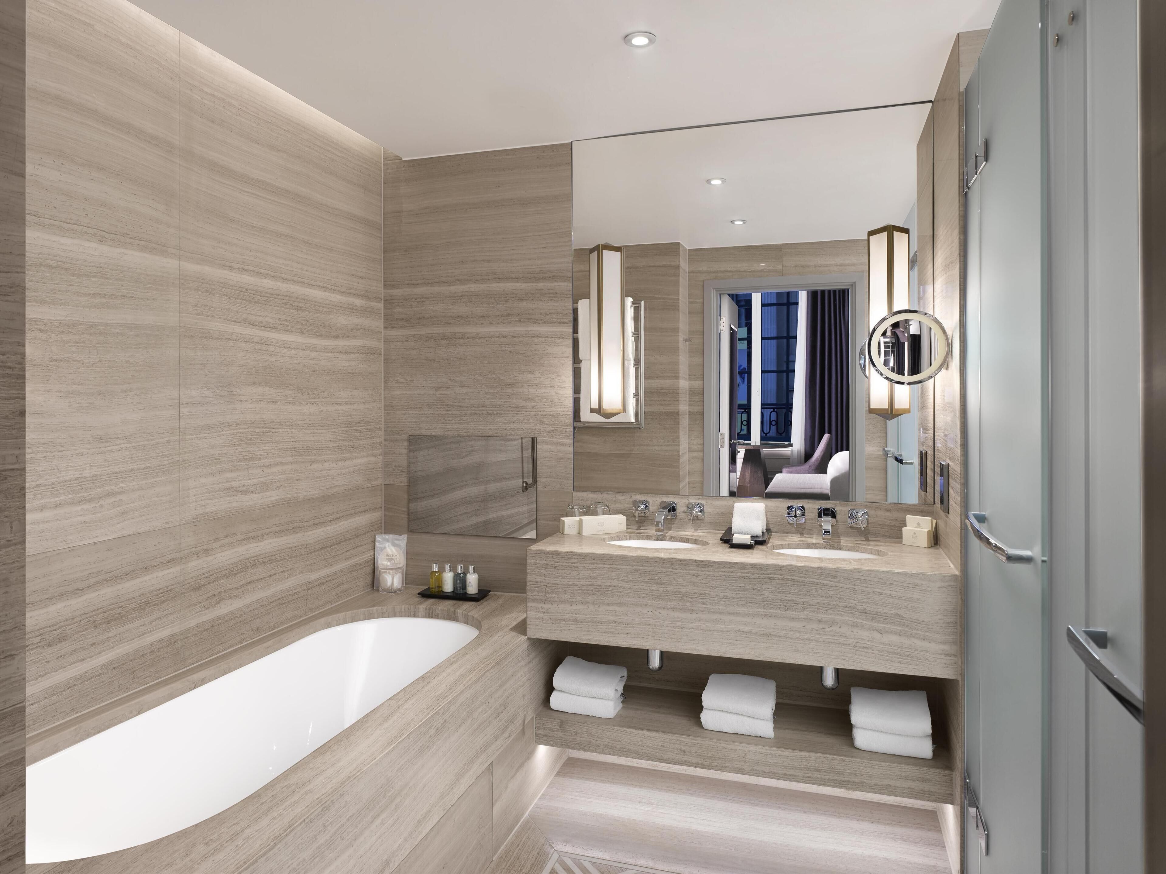 studio suite | bathroom | shower, designer toiletries, hair dryer, bathrobes