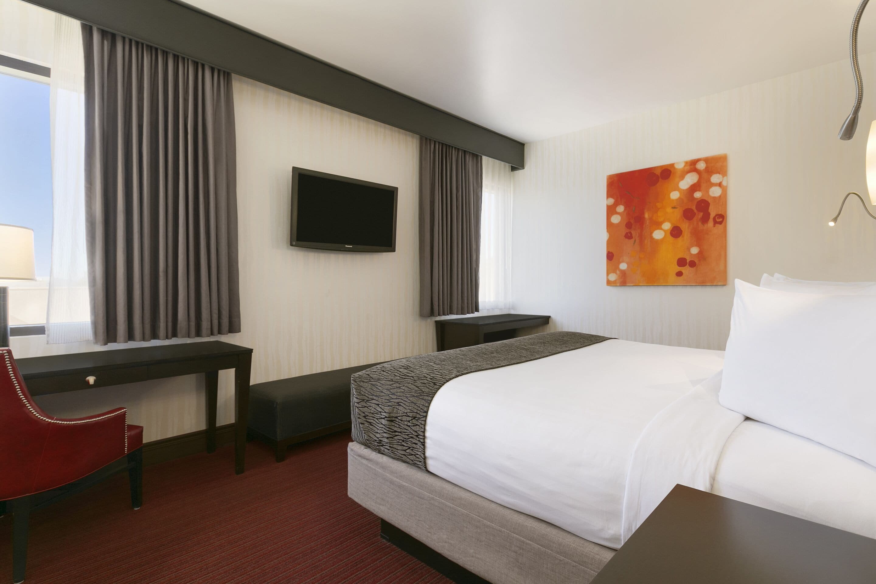 classic room, 1 king bed (cactus tower) | in-room safe, iron/ironing board, rollaway beds, bed sheets