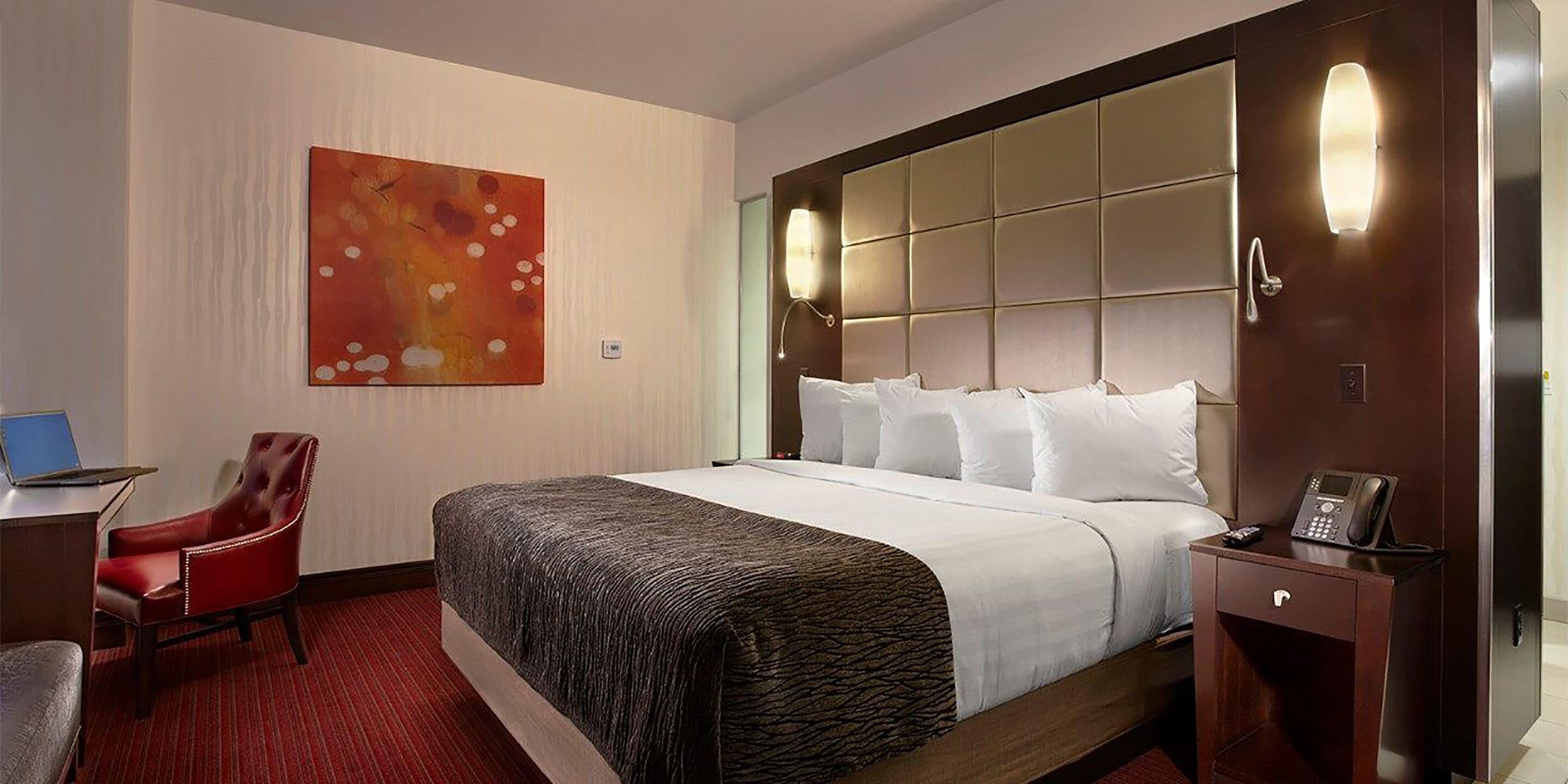 classic room, 1 king bed (cactus tower) | in-room safe, iron/ironing board, rollaway beds, bed sheets