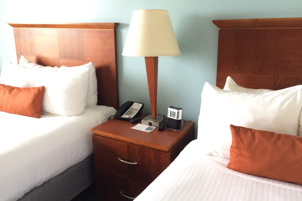 Desk, blackout drapes, iron/ironing board, free cribs/infant beds