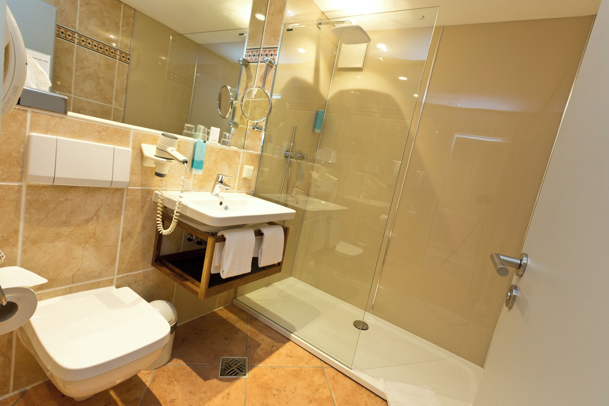 hair dryer, towels, soap, shampoo