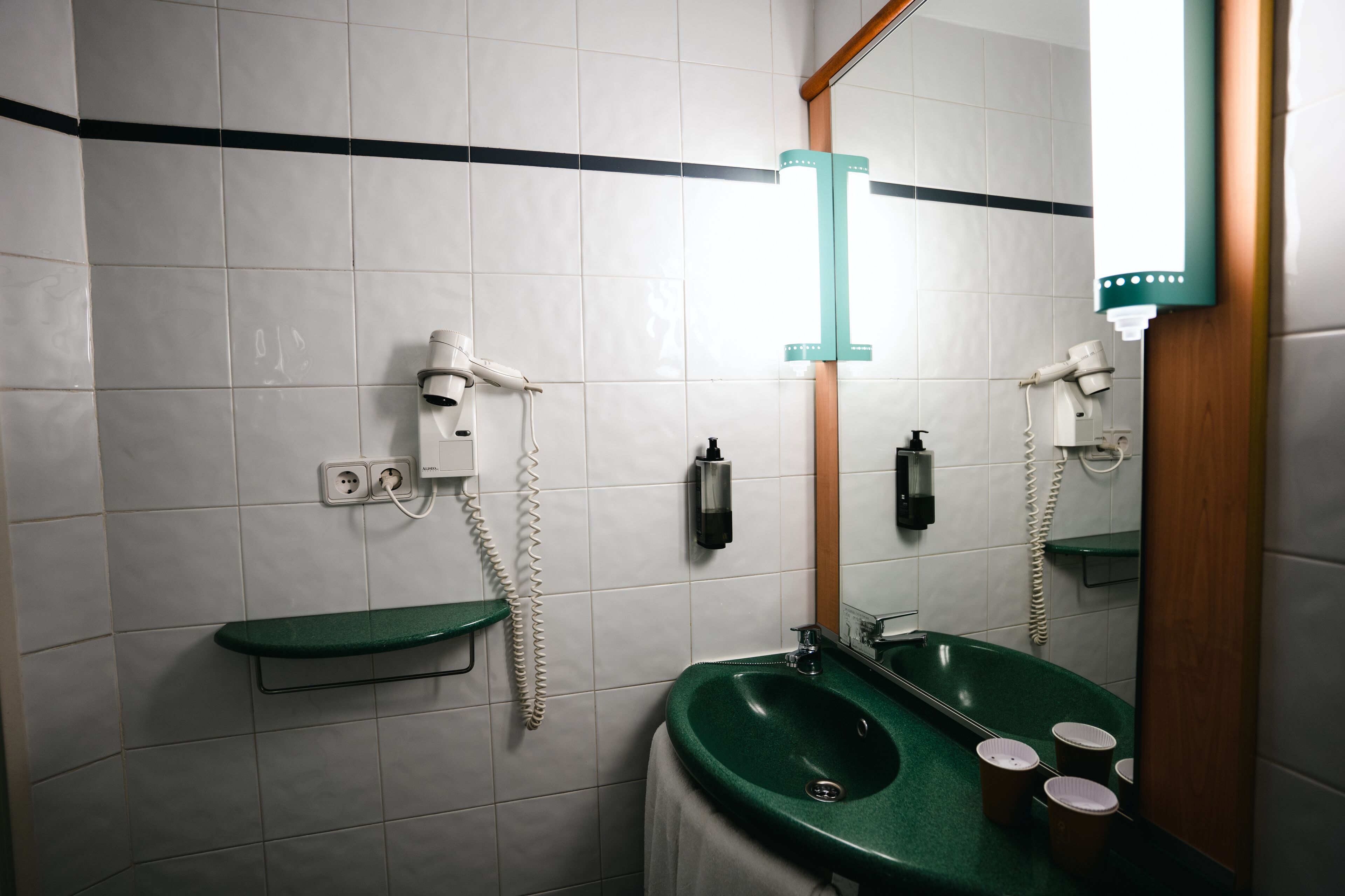 shower, eco-friendly toiletries, hair dryer, towels