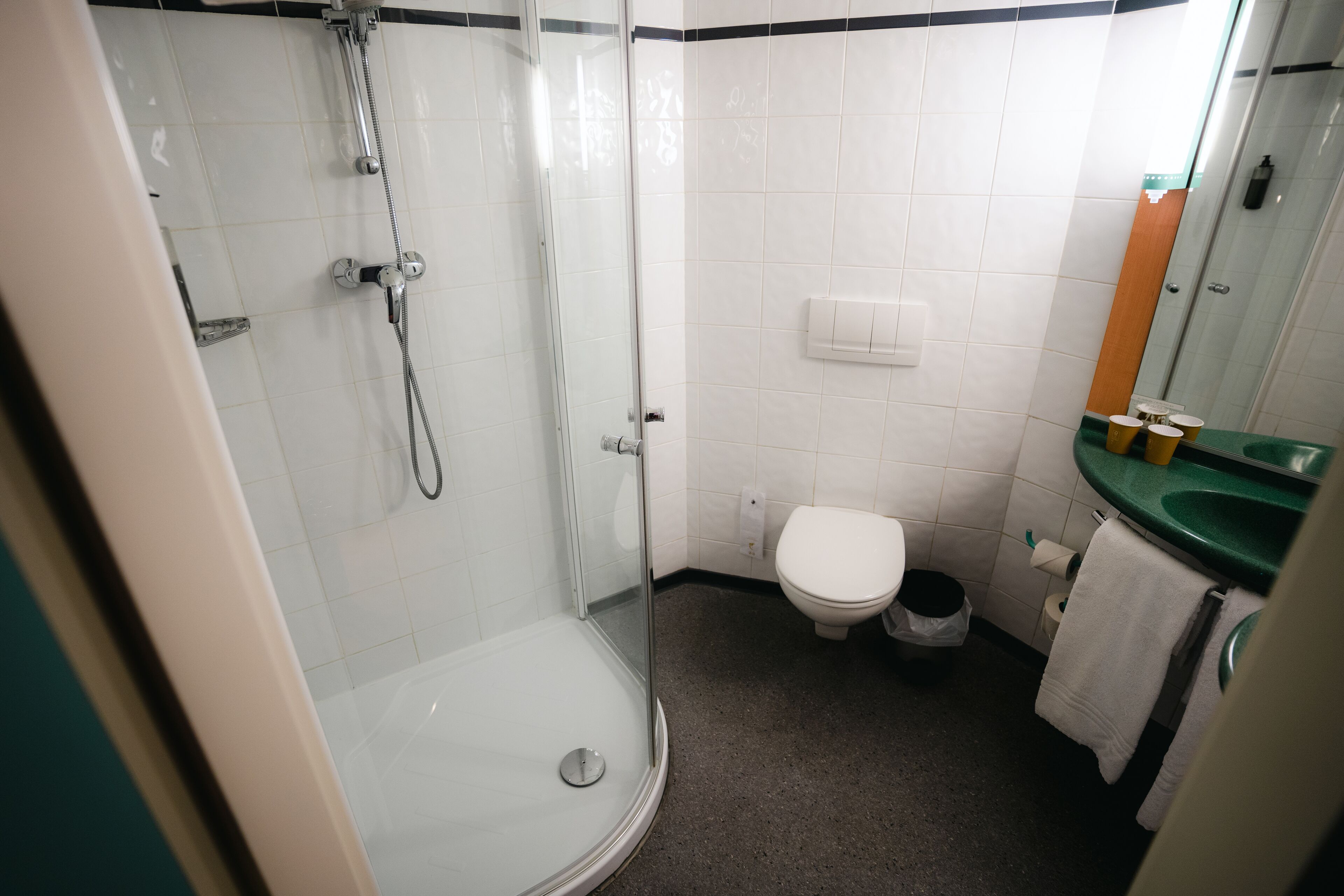 shower, eco-friendly toiletries, hair dryer, towels