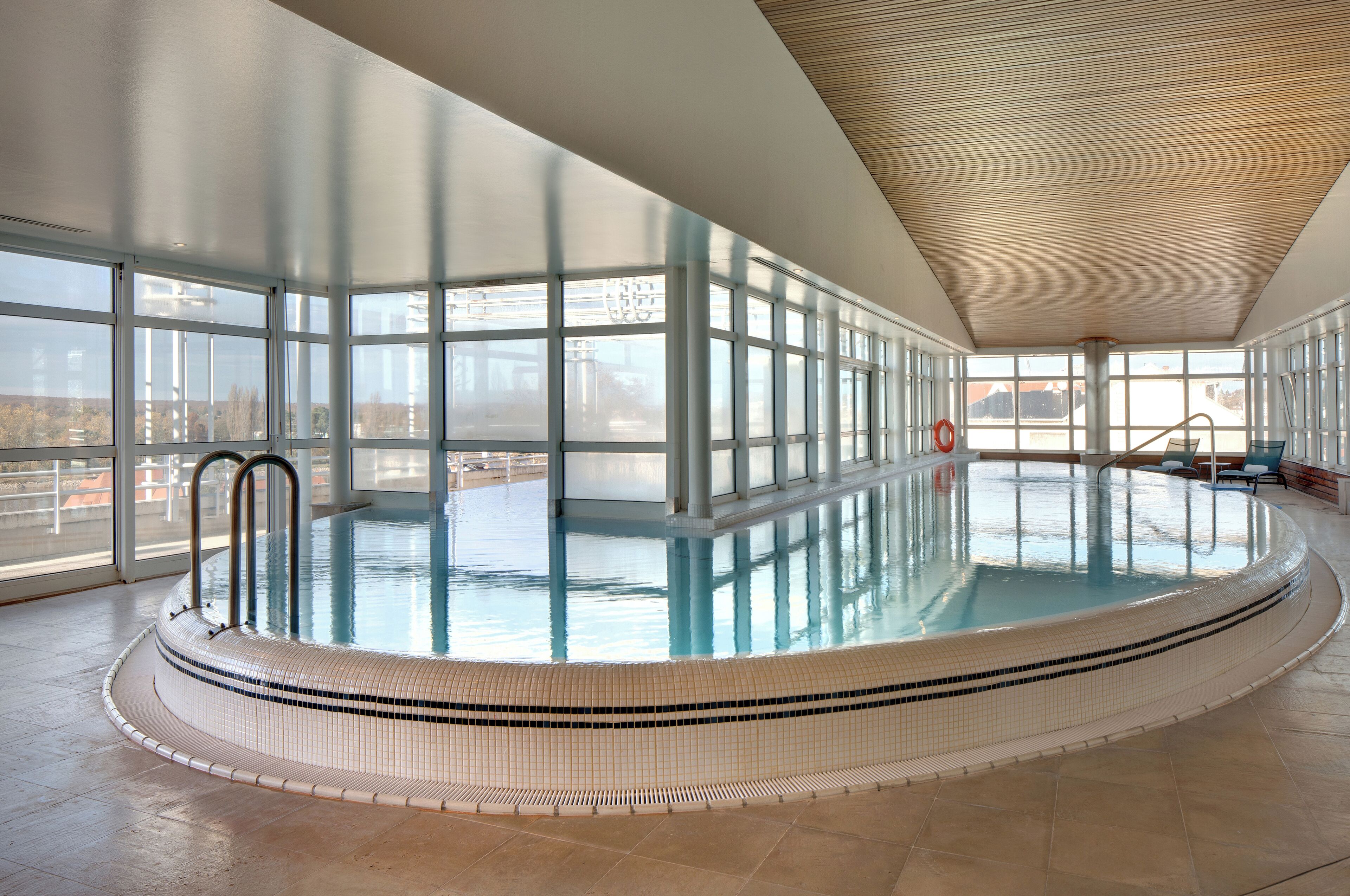 indoor pool, outdoor pool, open 8:00 am to 10:00 pm, pool umbrellas