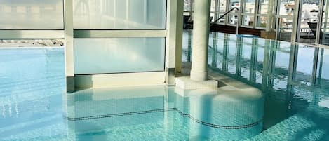 Indoor pool, outdoor pool, open 8:00 AM to 10:00 PM, pool umbrellas