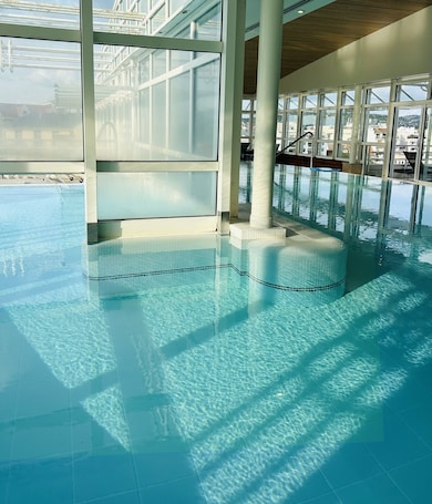 Indoor pool, outdoor pool, open 8:00 AM to 10:00 PM, pool umbrellas
