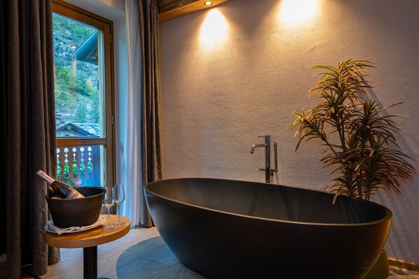 Suite Deluxe, sauna | Servicios de la habitación