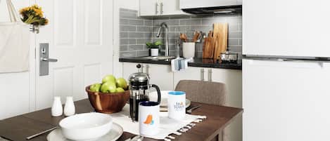 Premium Room, 1 Queen Bed | Private kitchen | Fridge, microwave, stovetop, dining tables