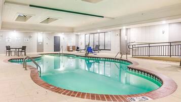 Indoor pool, open 10:00 AM to 10:00 PM, pool loungers
