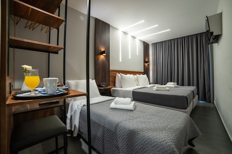 2 habitaciones, cortinas blackout y tabla de planchar con plancha