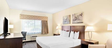 Hypo-allergenic bedding, desk, laptop workspace, blackout curtains