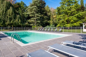 Seasonal outdoor pool, open 9:30 AM to 7:00 PM, sun loungers