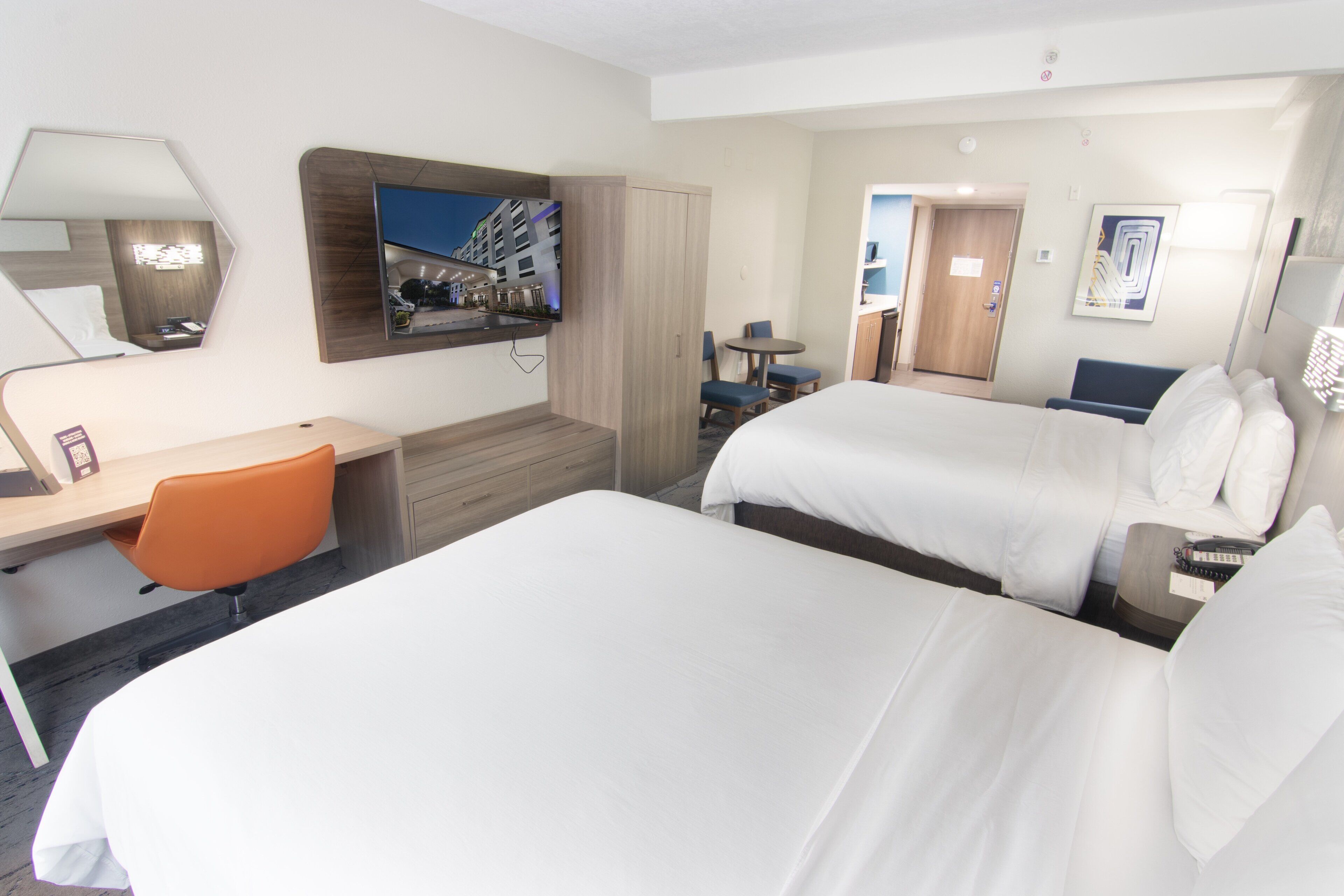 suite, 2 queen beds | in-room safe, desk, iron/ironing board, free cots/infant beds