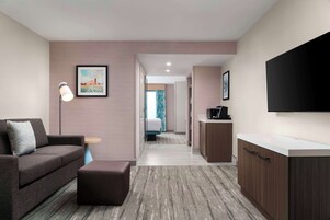 Junior Suite, 1 King Bed | Living area | 37-inch LCD TV with cable channels, TV, pay movies