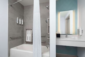 Designer toiletries, hair dryer, towels