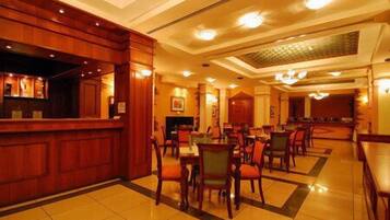 3 restaurants, breakfast, lunch, dinner served; Indian cuisine