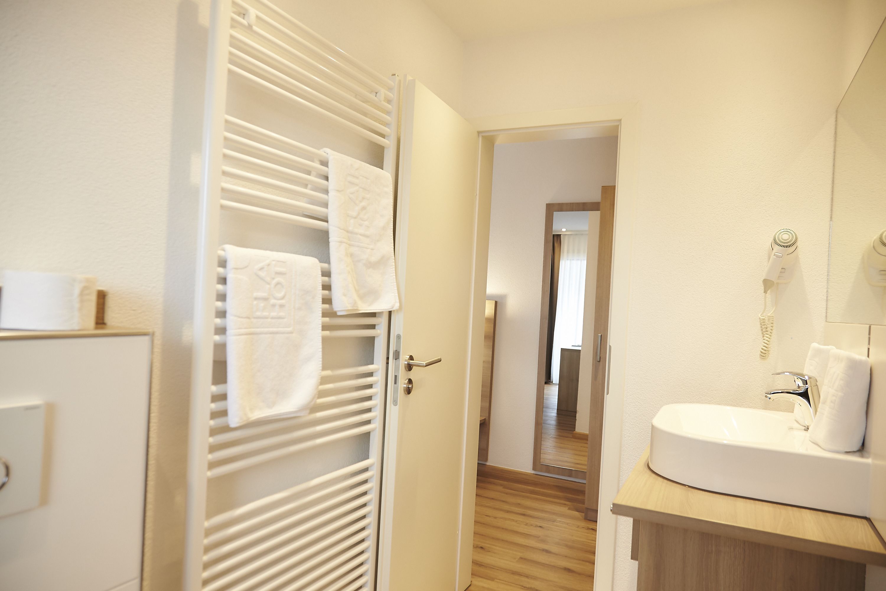 premium double room, 1 queen bed | bathroom | hair dryer, towels