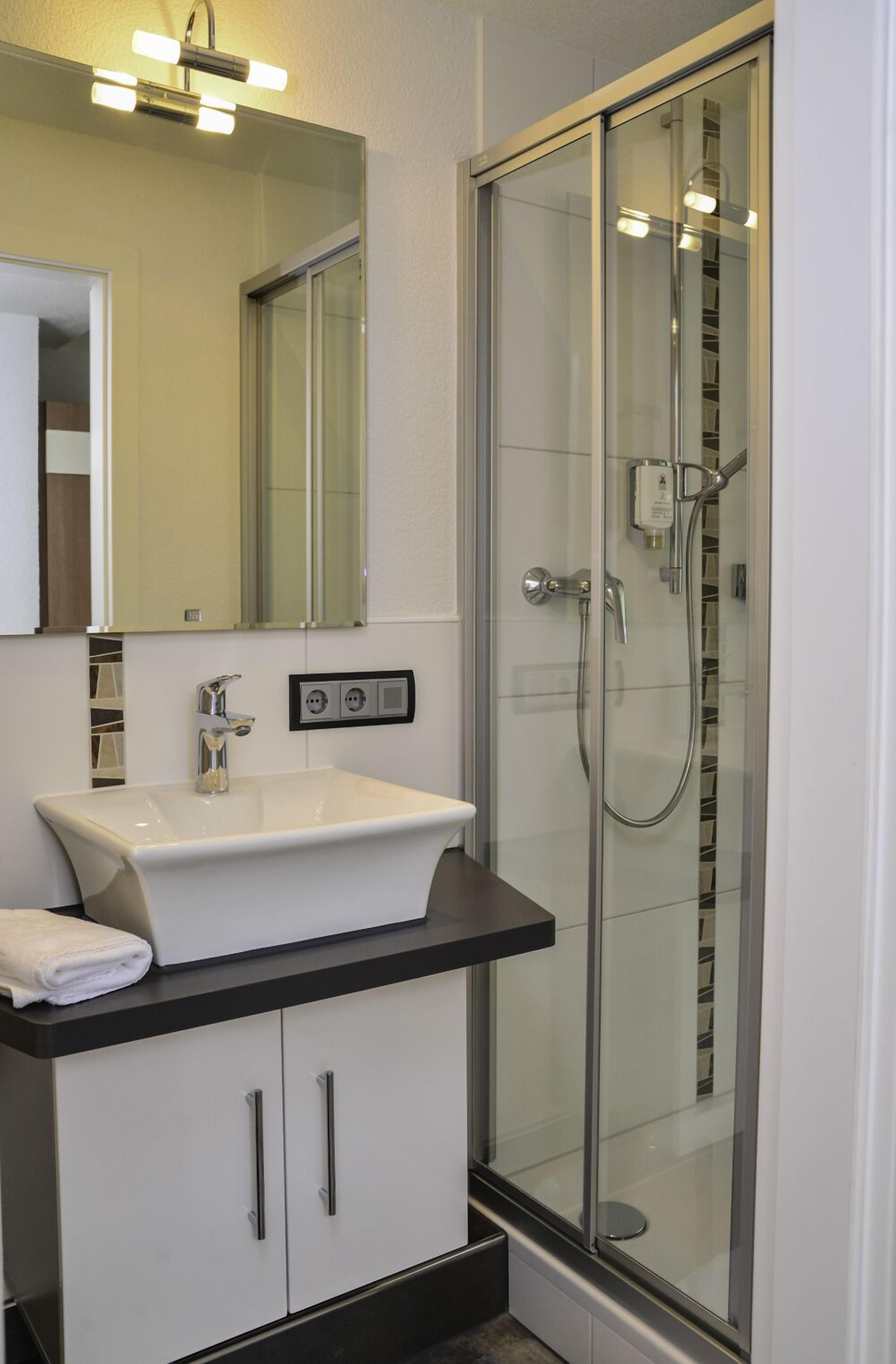 superior single room, 1 large single bed | bathroom | hair dryer, towels