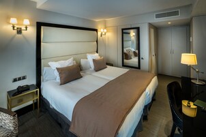 Deluxe Double Room | Minibar, in-room safe, iron/ironing board (on request), free WiFi