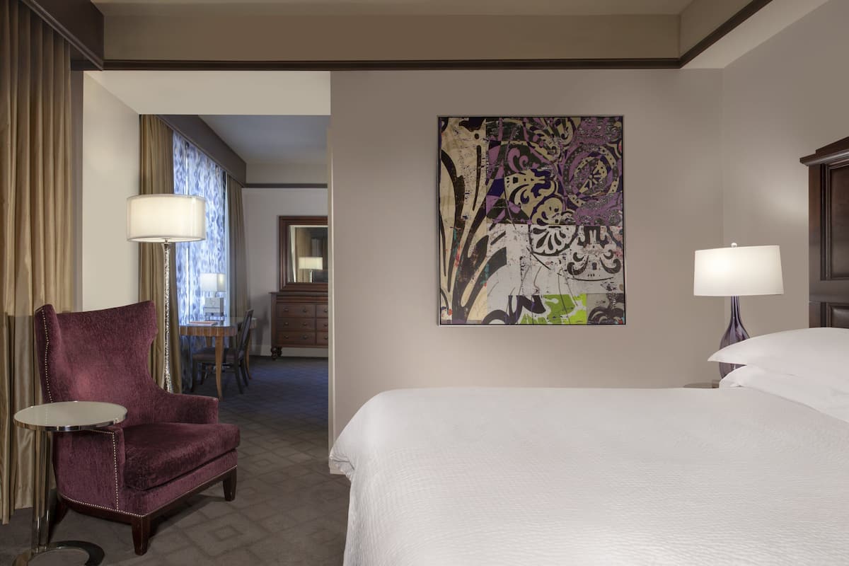 Premium bedding, down comforters, pillowtop beds, in-room safe