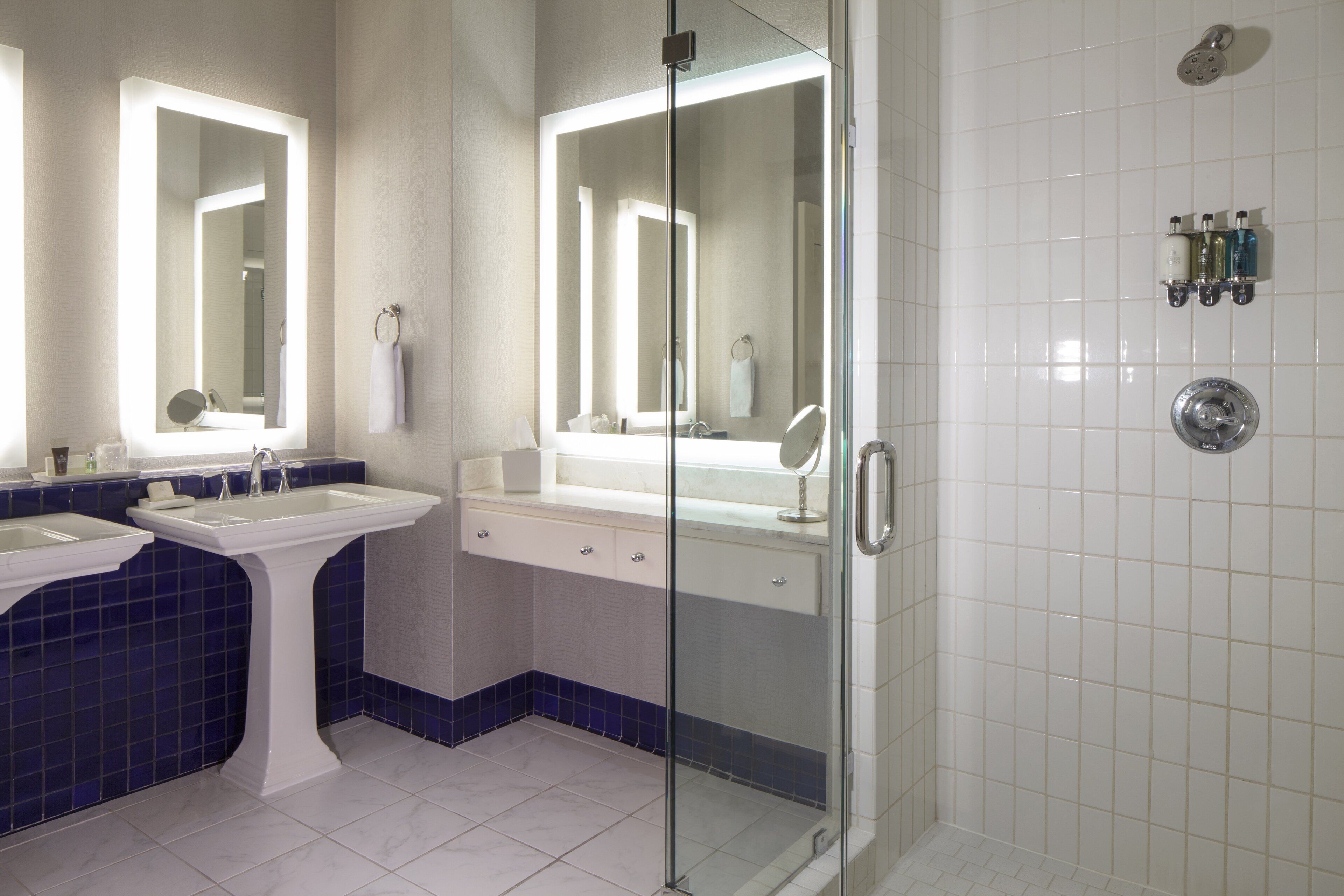 designer toiletries, hair dryer, bathrobes, towels