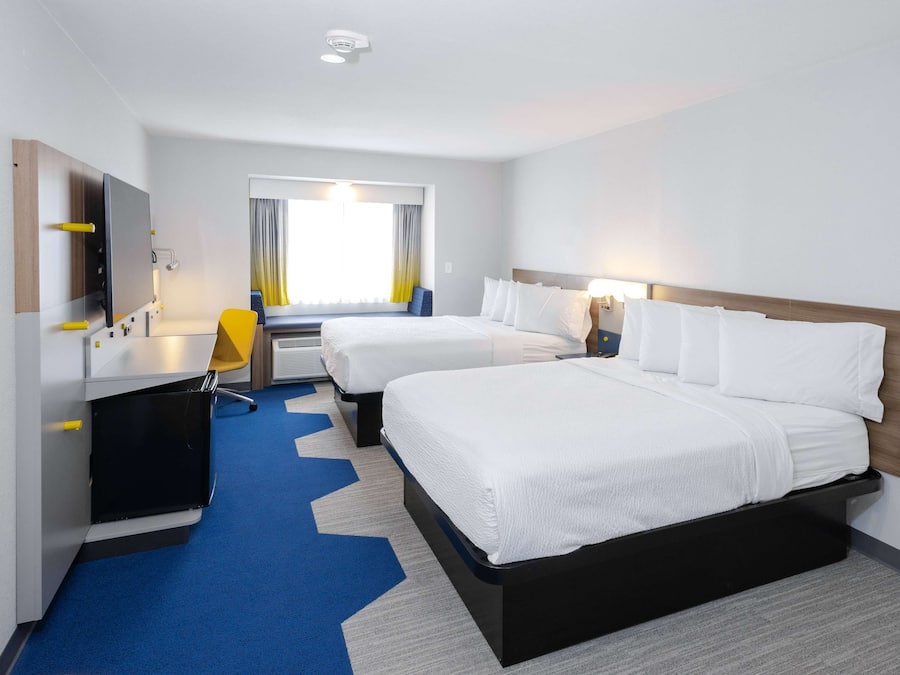 Suite, 2 Queen Beds, Non Smoking | Desk, iron/ironing board, free cribs/infant beds, free WiFi