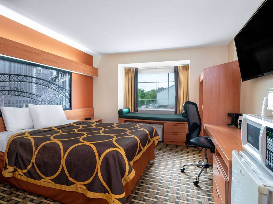 Desk, laptop workspace, blackout curtains, iron/ironing board