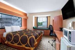 Desk, laptop workspace, blackout drapes, iron/ironing board