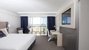 A hotel room with a bed, desk, chair, and a large window with curtains. - Best Western Plus Hotel Lord Forrest (Bunbury)