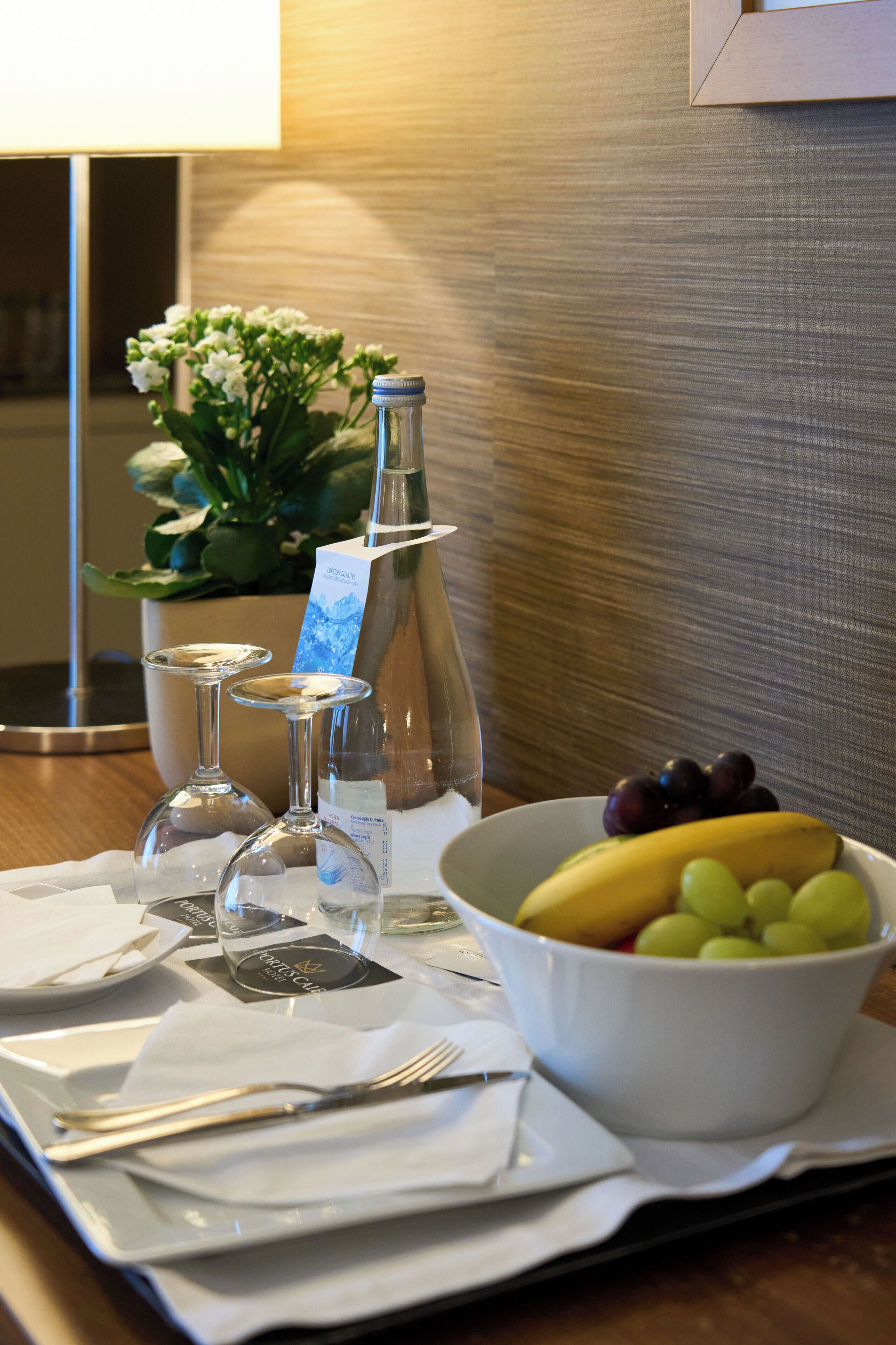 junior suite, 1 king bed with sofa bed, city view | in-room dining