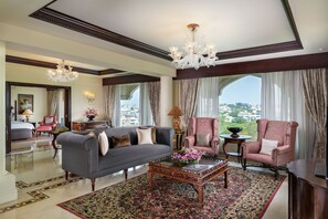 Presidential Suite (Plunge Pool) | Living area | 32-inch LCD TV with satellite channels, TV, DVD player - Taj Krishna (Hyderabad)