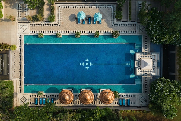 Outdoor pool, open 8:00 AM to 8:00 PM, pool umbrellas, sun loungers