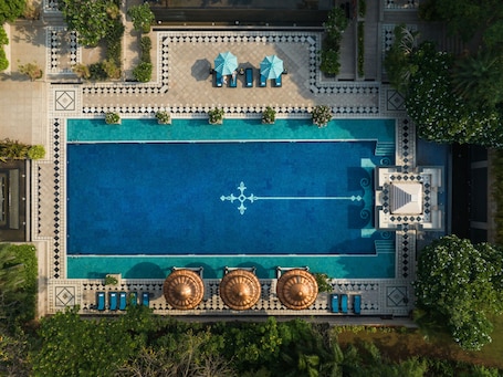 Outdoor pool, open 8:00 AM to 8:00 PM, pool umbrellas, sun loungers