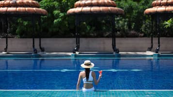 Outdoor pool, open 8:00 AM to 8:00 PM, pool umbrellas, sun loungers