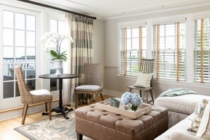 Luxury Suite, 1 Bedroom, Balcony | Living room | Flat-screen TV
