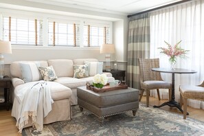 Luxury Suite, 1 Bedroom, Balcony | Living room | Flat-screen TV