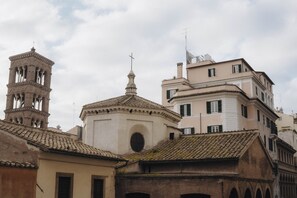 A historic building with a bell tower and a dome.