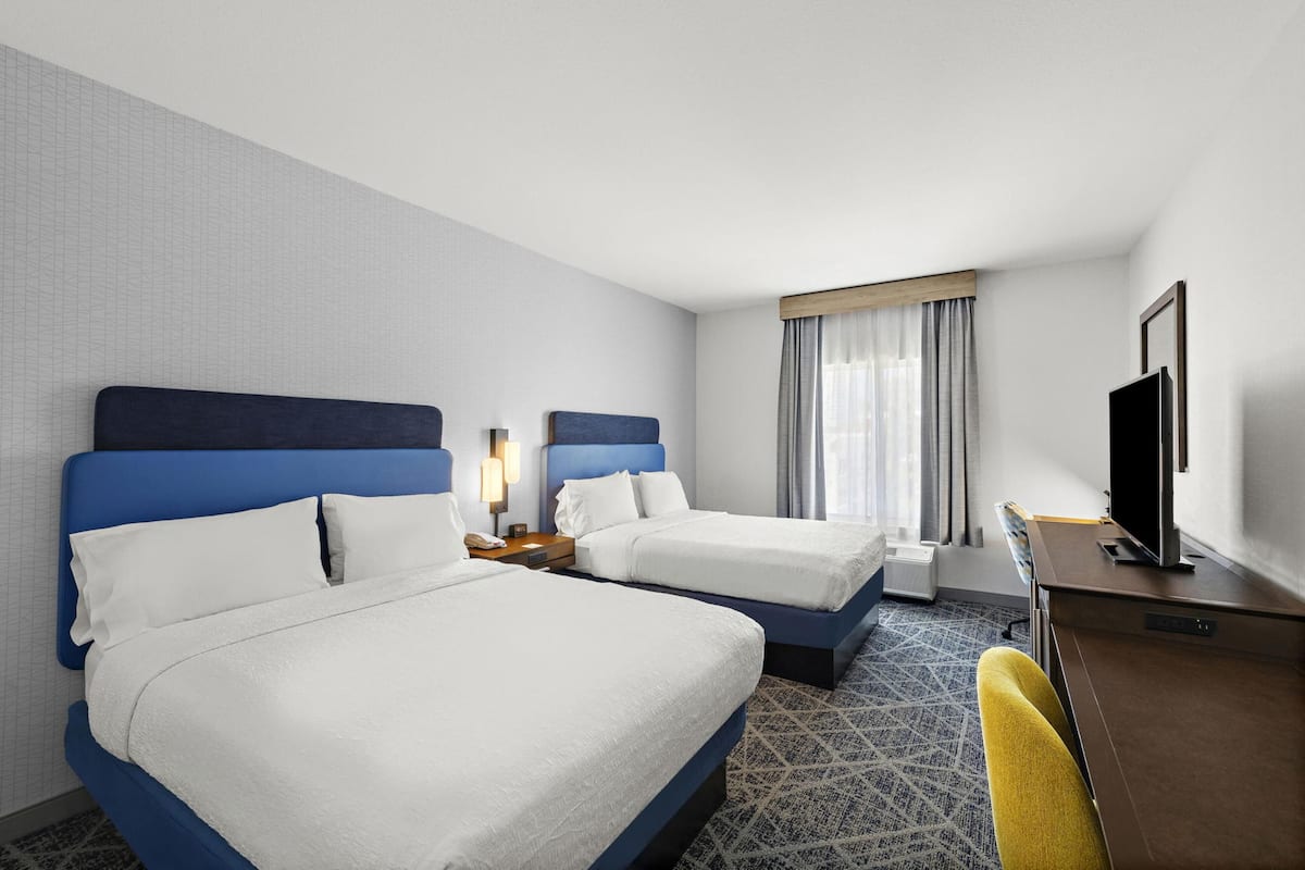 Room, 2 Queen Beds, Non Smoking, Refrigerator & Microwave | In-room safe, desk, laptop workspace, blackout drapes