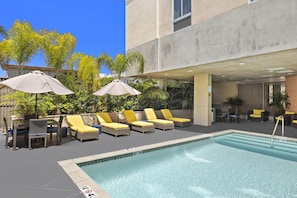 Outdoor pool, open 8:00 AM to 10:00 PM, pool umbrellas, pool loungers