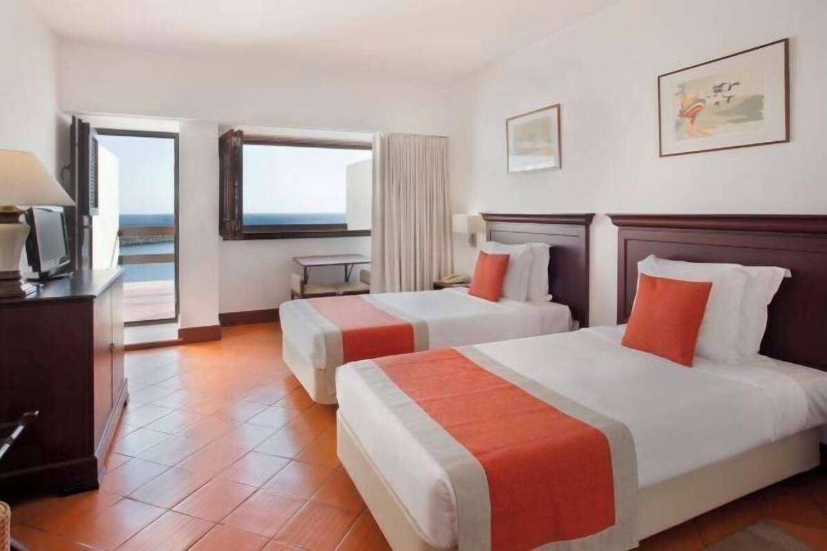 Desk, blackout drapes, rollaway beds (surcharge), WiFi (free)