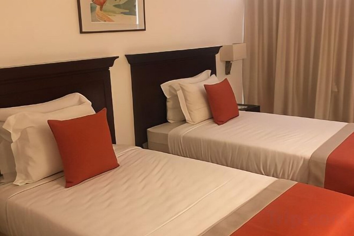 Desk, blackout curtains, rollaway beds, free WiFi