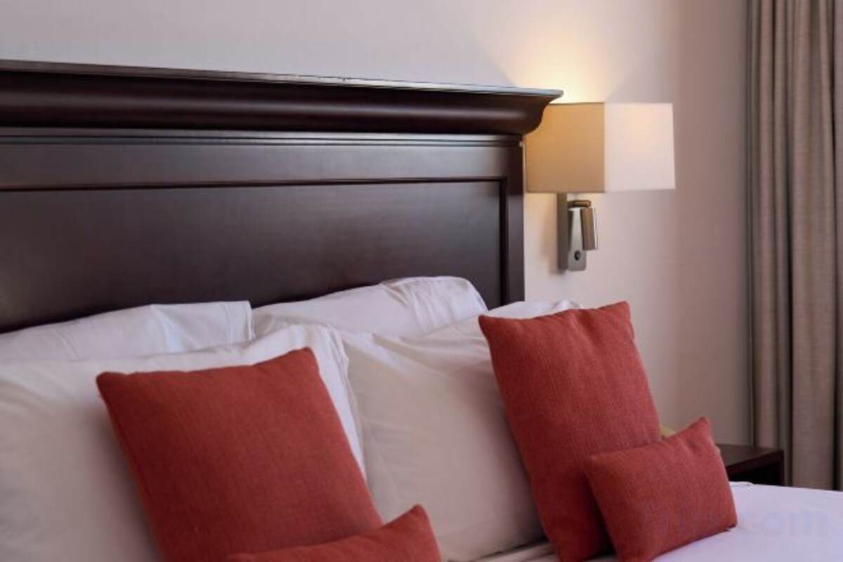 Desk, blackout drapes, rollaway beds (surcharge), WiFi (free)