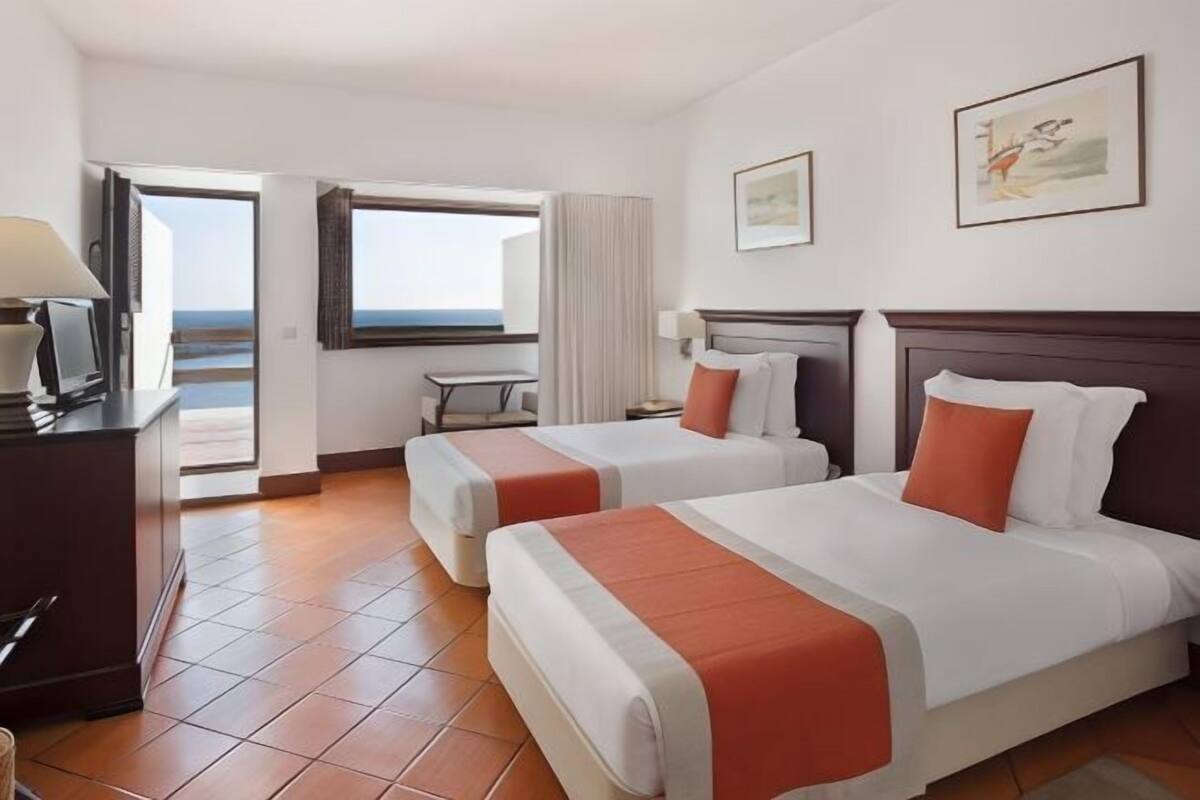 Desk, blackout drapes, rollaway beds (surcharge), WiFi (free)