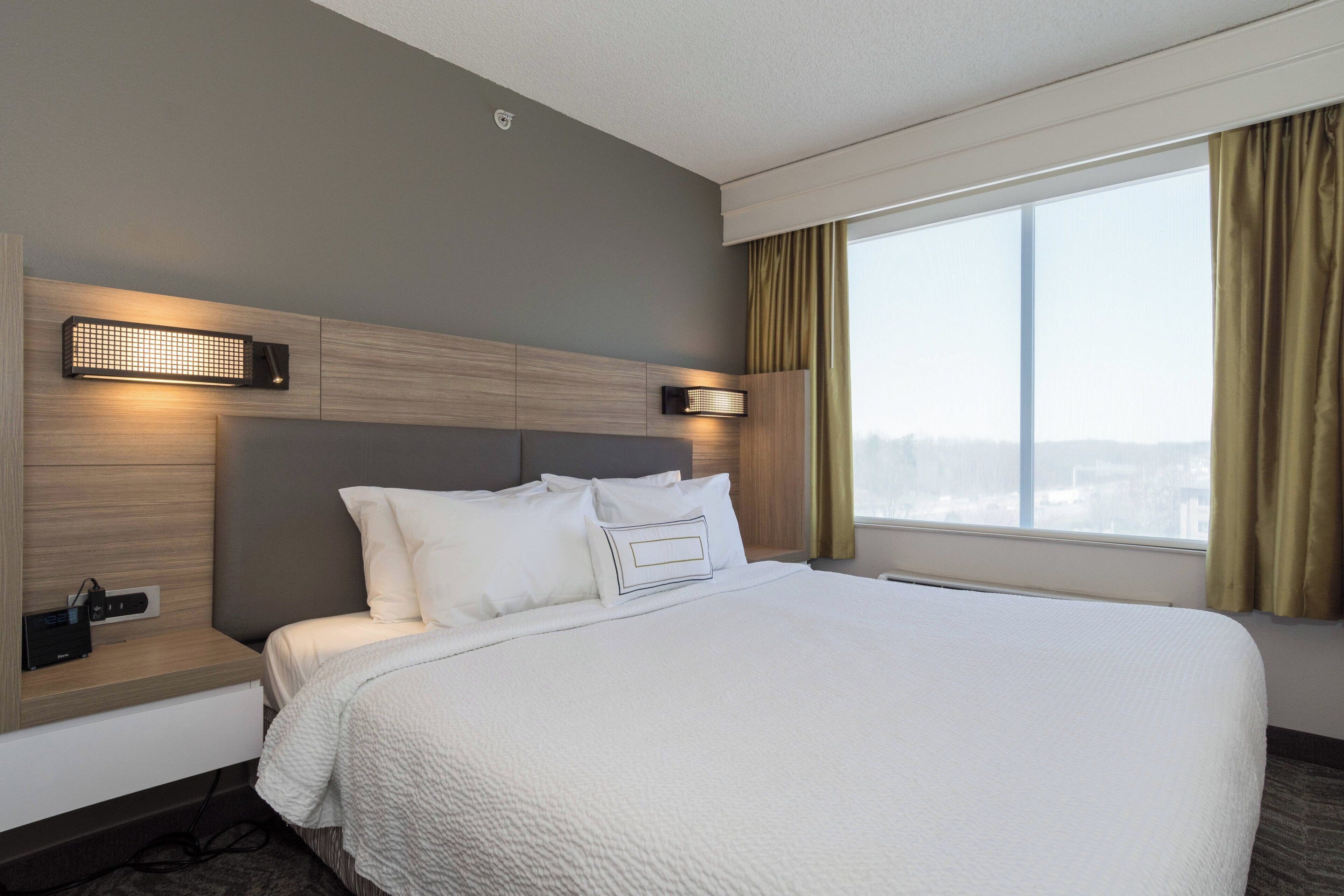 Down duvets, pillow-top beds, desk, laptop workspace