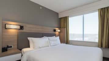 Down comforters, pillowtop beds, desk, laptop workspace